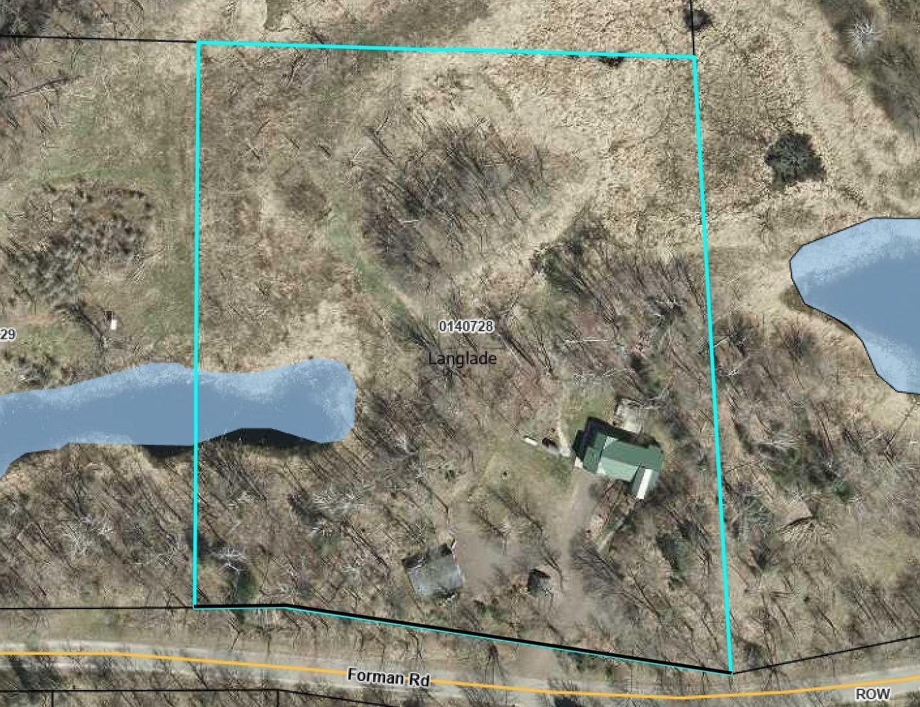 Property boundary map showing the parcel outline along Forman Road with a pond to the west